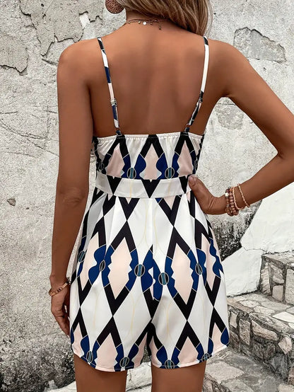 Korte zomerjumpsuit met V-hals en abstracte print | Babette