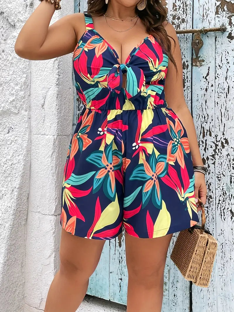 Plus size jumpsuit met bloemenprint en strik rond de boezem | Talitha