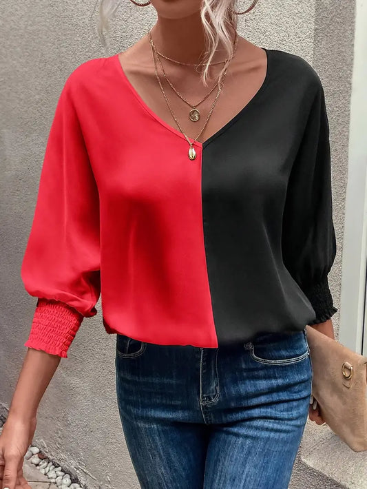 Blouse met bisschopmouwen en rood/zwarte kleurblokken | Loes