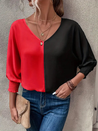 Blouse met bisschopmouwen en rood/zwarte kleurblokken | Loes