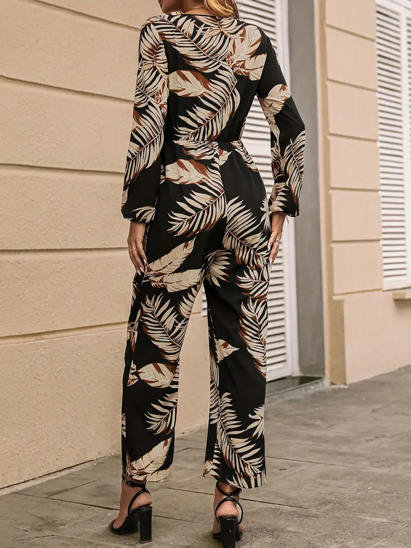 V-hals jumpsuit met exotische print en bisschopmouwen | Aisha