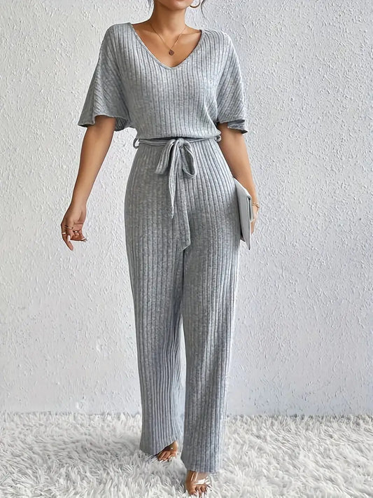 Comfortabele jumpsuit met V-hals en strikceintuur | Else