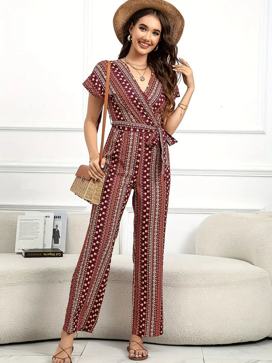 V-hals jumpsuit met strikriem en abstracte print | Alice