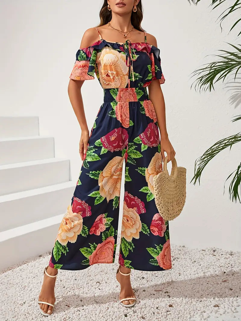 Mouwloze jumpsuit met bloemenprint en spaghettibandjes, open schouders | Caren