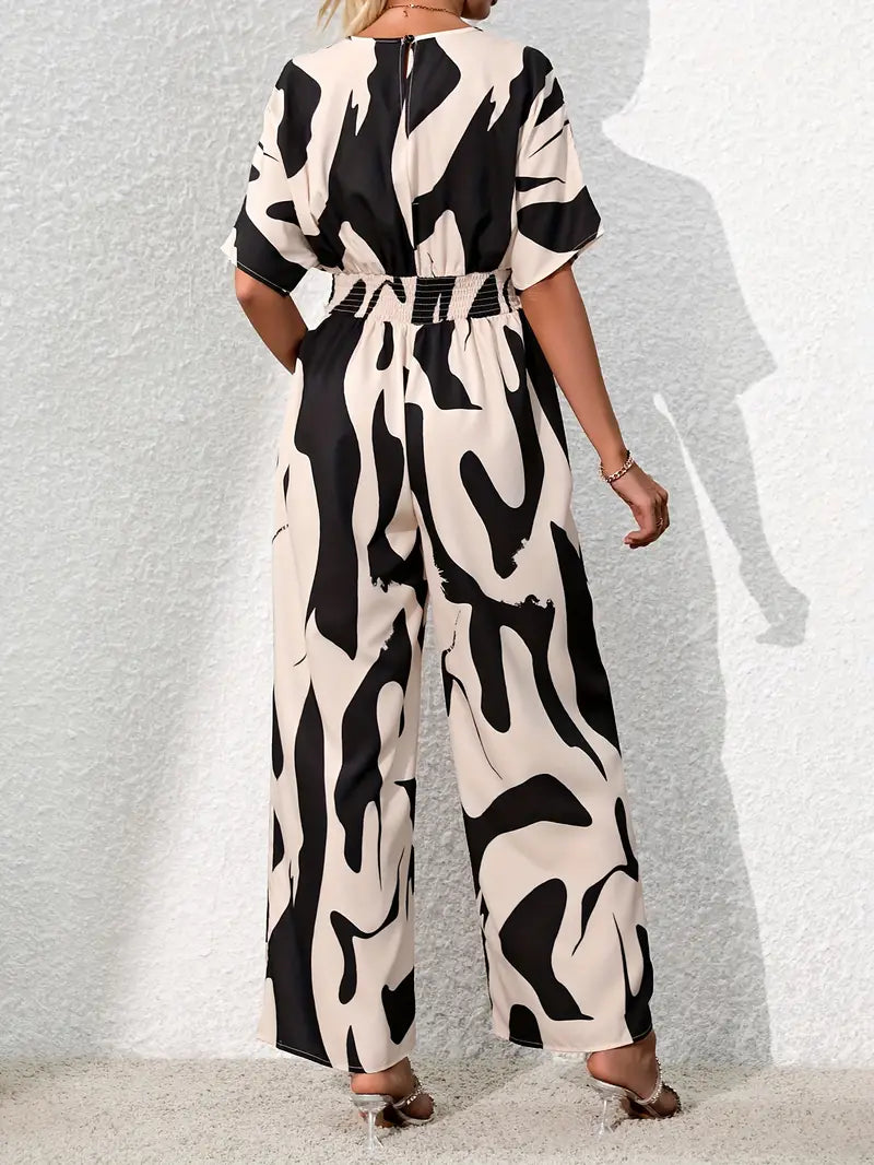 Elegante jumpsuit met V-hals en abstracte print | Francisca