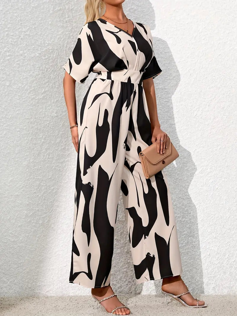 Elegante jumpsuit met V-hals en abstracte print | Francisca