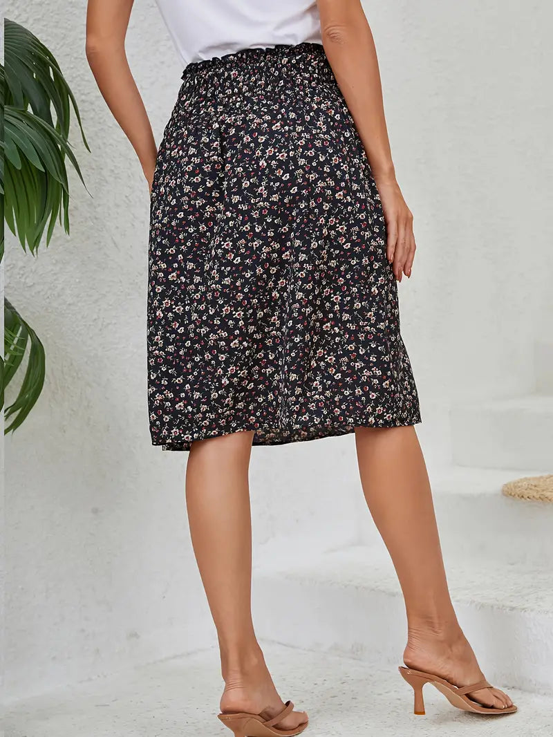 Halflange zwarte rok met bloemenprint | Solange