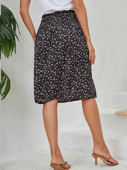 Halflange zwarte rok met bloemenprint | Solange