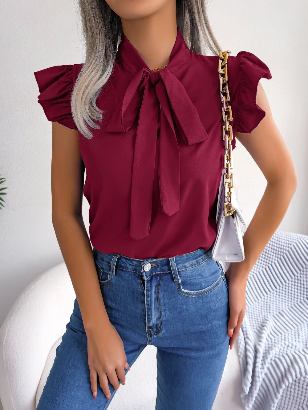 Lichte zomerblouse met strik aan de kraag | Gisela