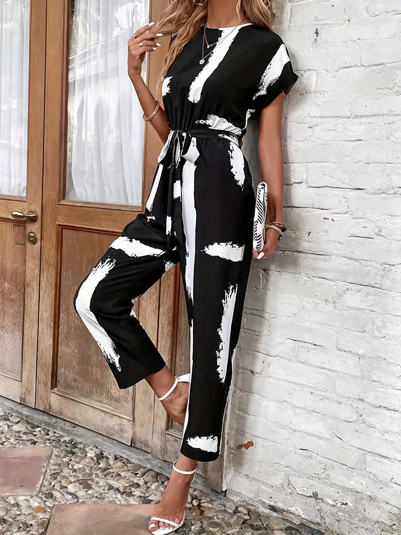 Zwarte jumpsuit met witte strepen | Mira