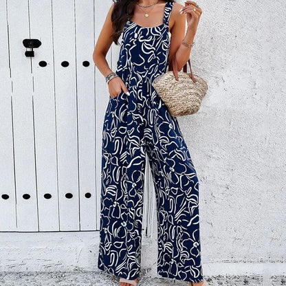 Lange jumpsuit met schouderbanden en motieven | Cathy